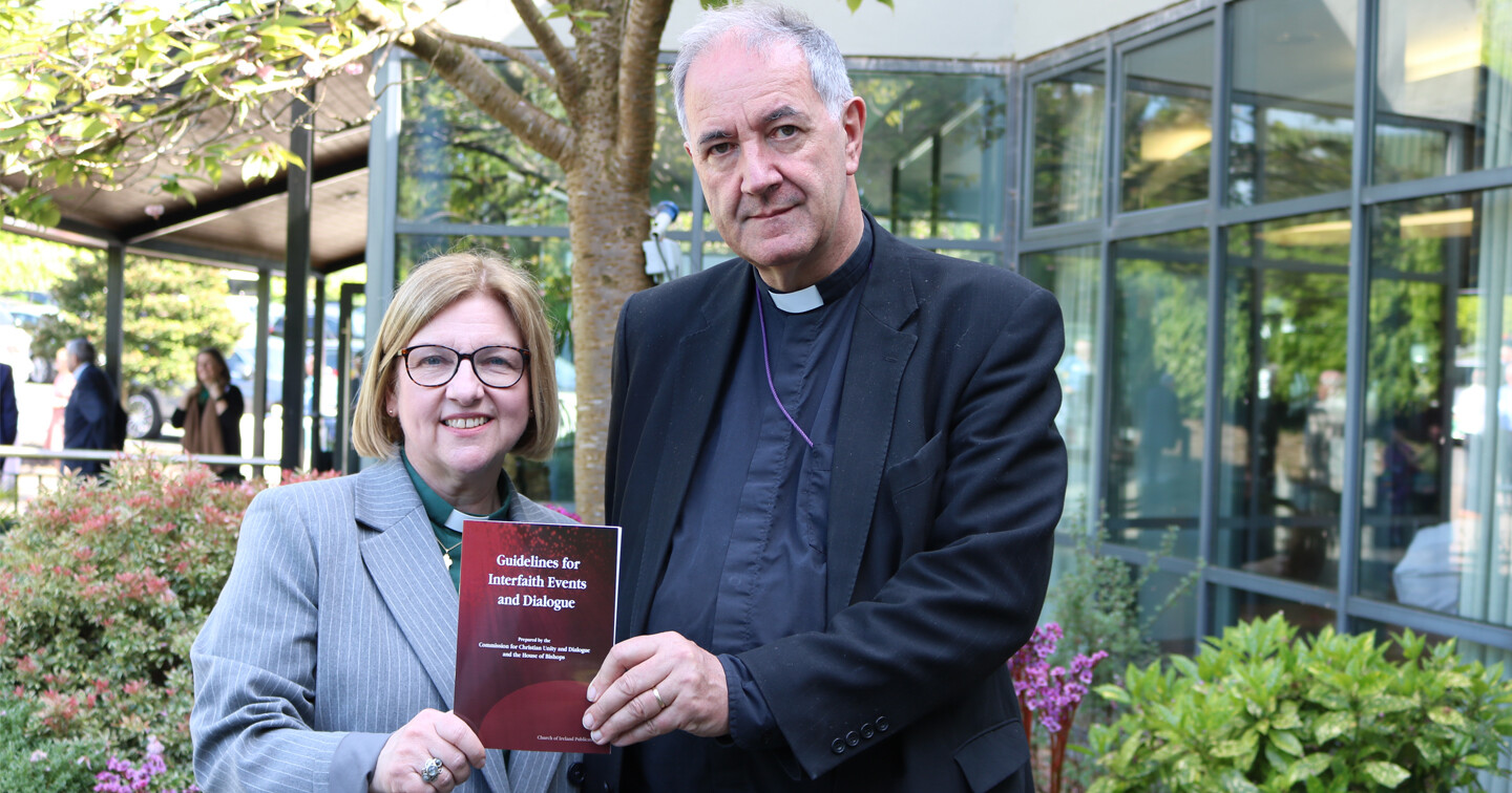The Revd Suzanne Cousins (Convenor of the Inter Faith Working Group) and Bishop Michael Burrows with the Guidelines at General Synod in Armagh.