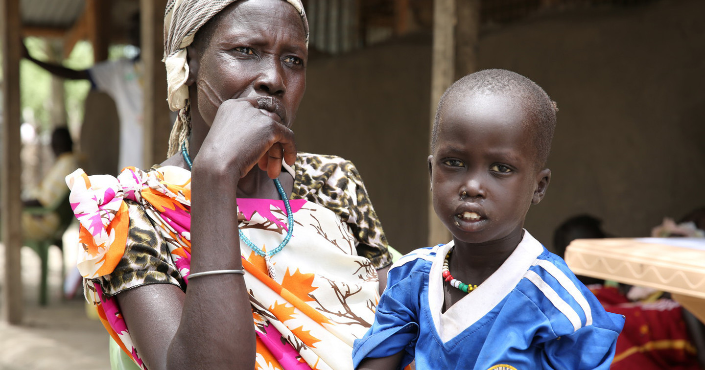 A mother and child at a feeding centre in South Sudan. Photograph courtesy of Polly Hughes/Tearfund.