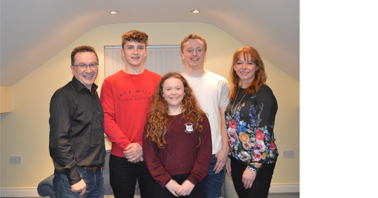 The Rev Paul Dundas, newly appointed Archdeacon of Dalriada, with his wife Nola and children.