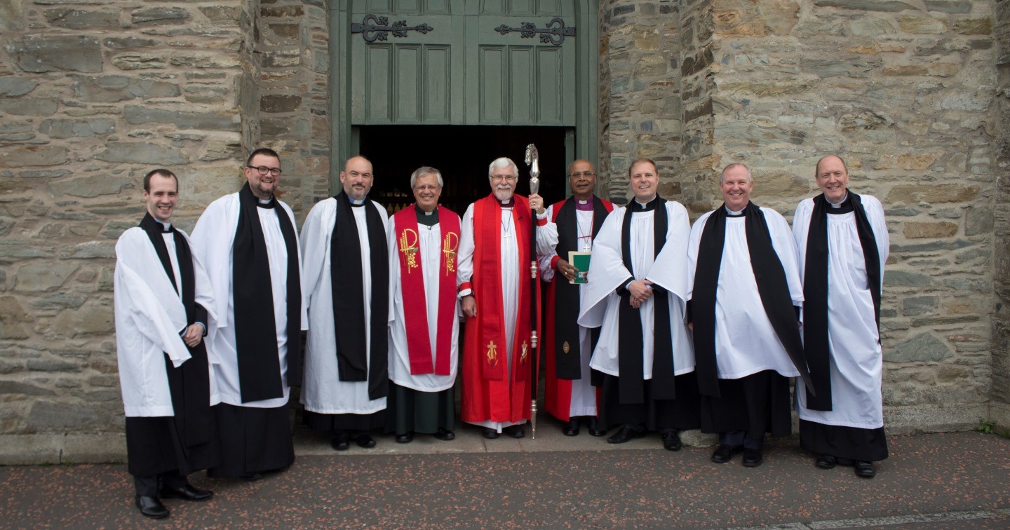Presbyters at their ordination service in Down Cathedral with (at centre) the Very Revd Henry Hull, Dean of Down, the Rt Revd Harold Miller, Bishop of Down and Dromore, and Bishop Michael Nazir–Ali.