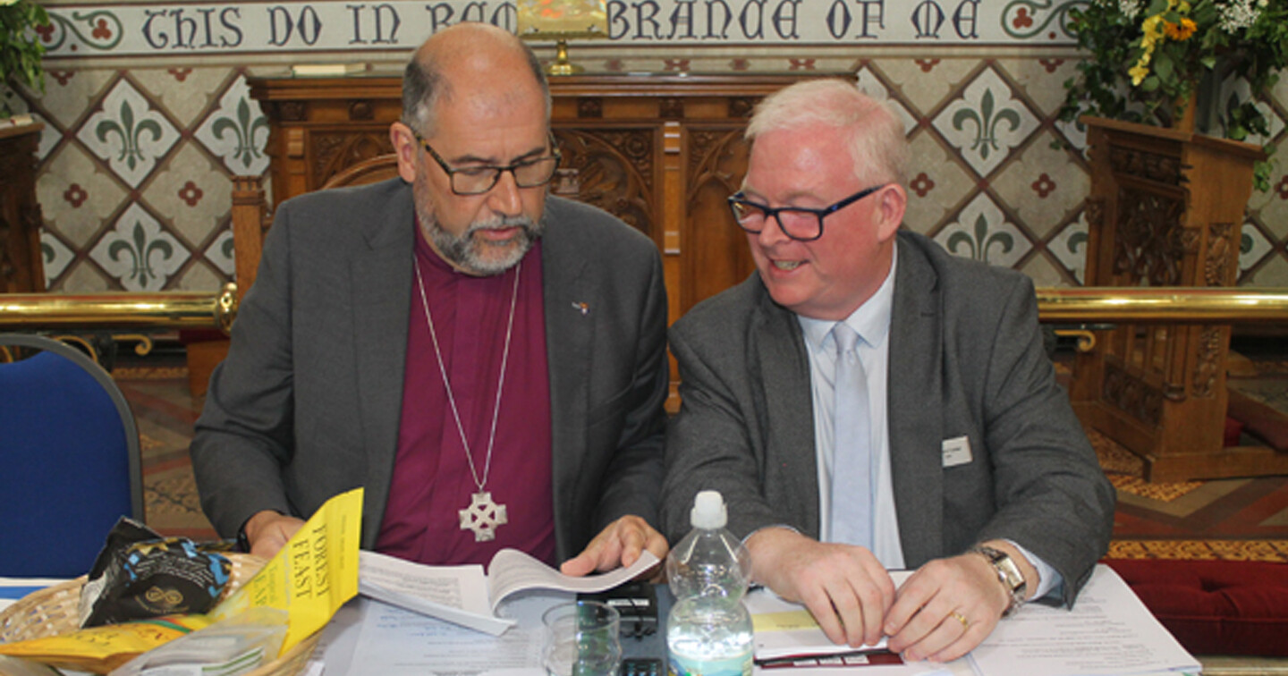 Bishop George Davison and Finance and Administration Manager Richard Cotter during the business of Synod.