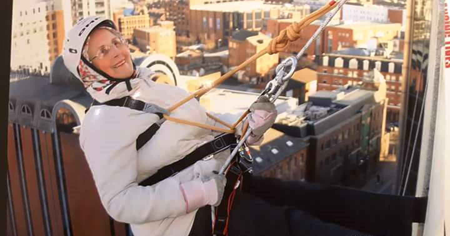 Sheila Smyth abseiling down the Europa Hotel.