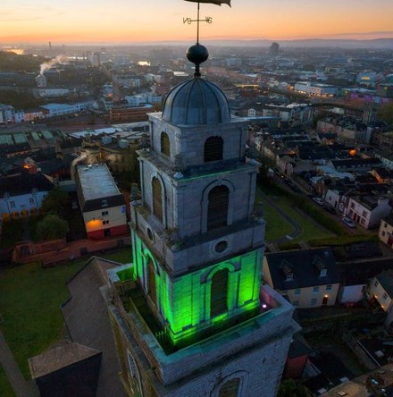 Iconic Shandon Church tower lights up in green for Saint Patrick’s Festival