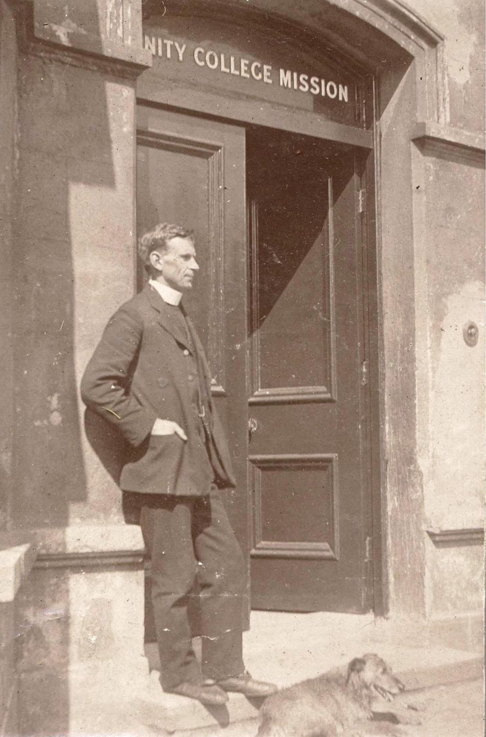 Revd Arthur Barton (1881-1962) Head of Mission 1912-14 at the door of the Trinity College Mission Belfast, RCB Library MS 295