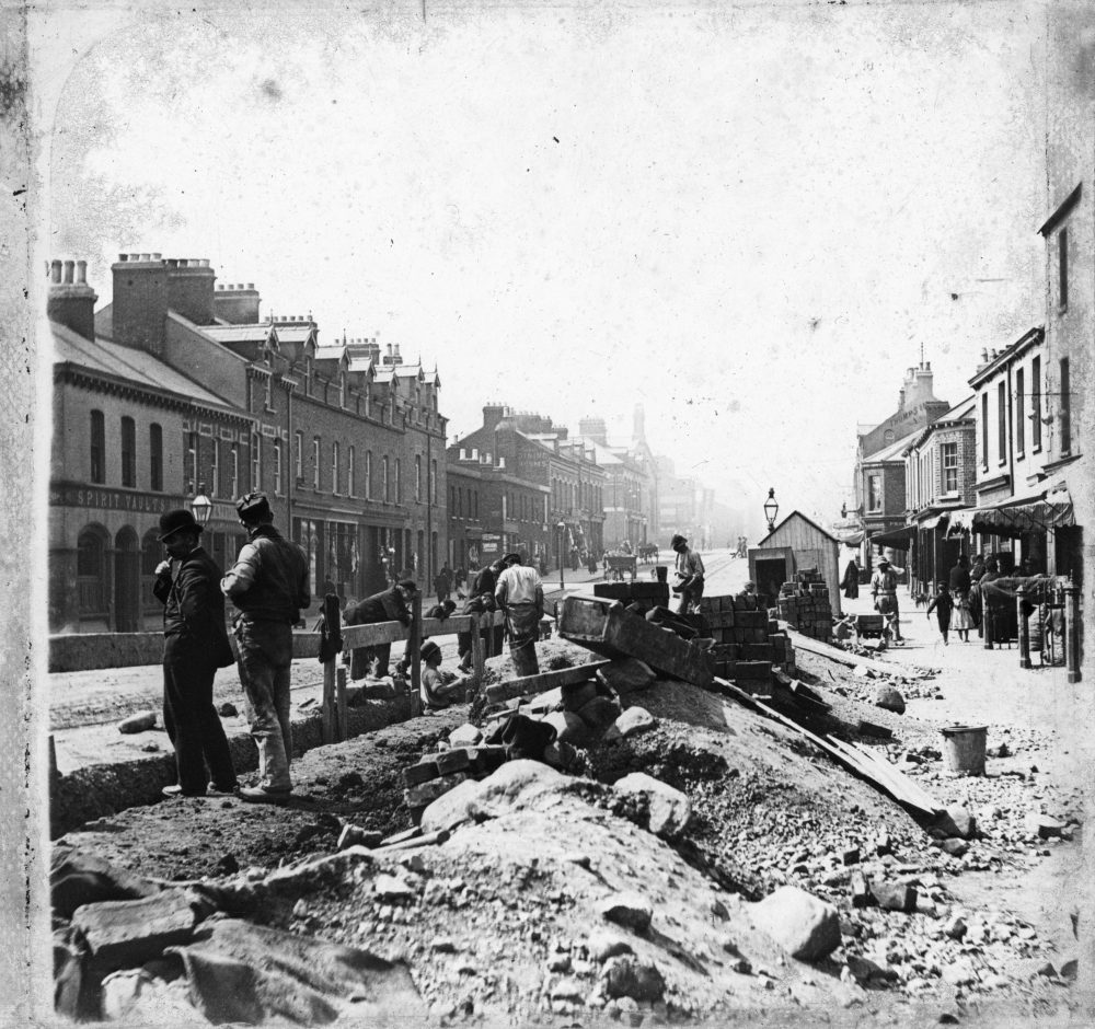 Road building in a large urban area, as yet unidentified, RCB Library “Killaloe” LS/Places 2.