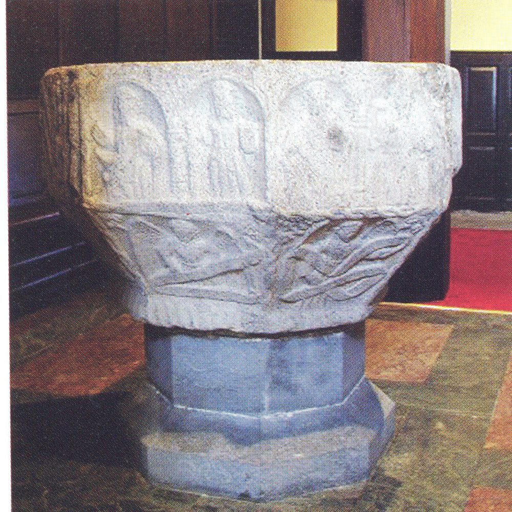 The medieval font in St Peter's