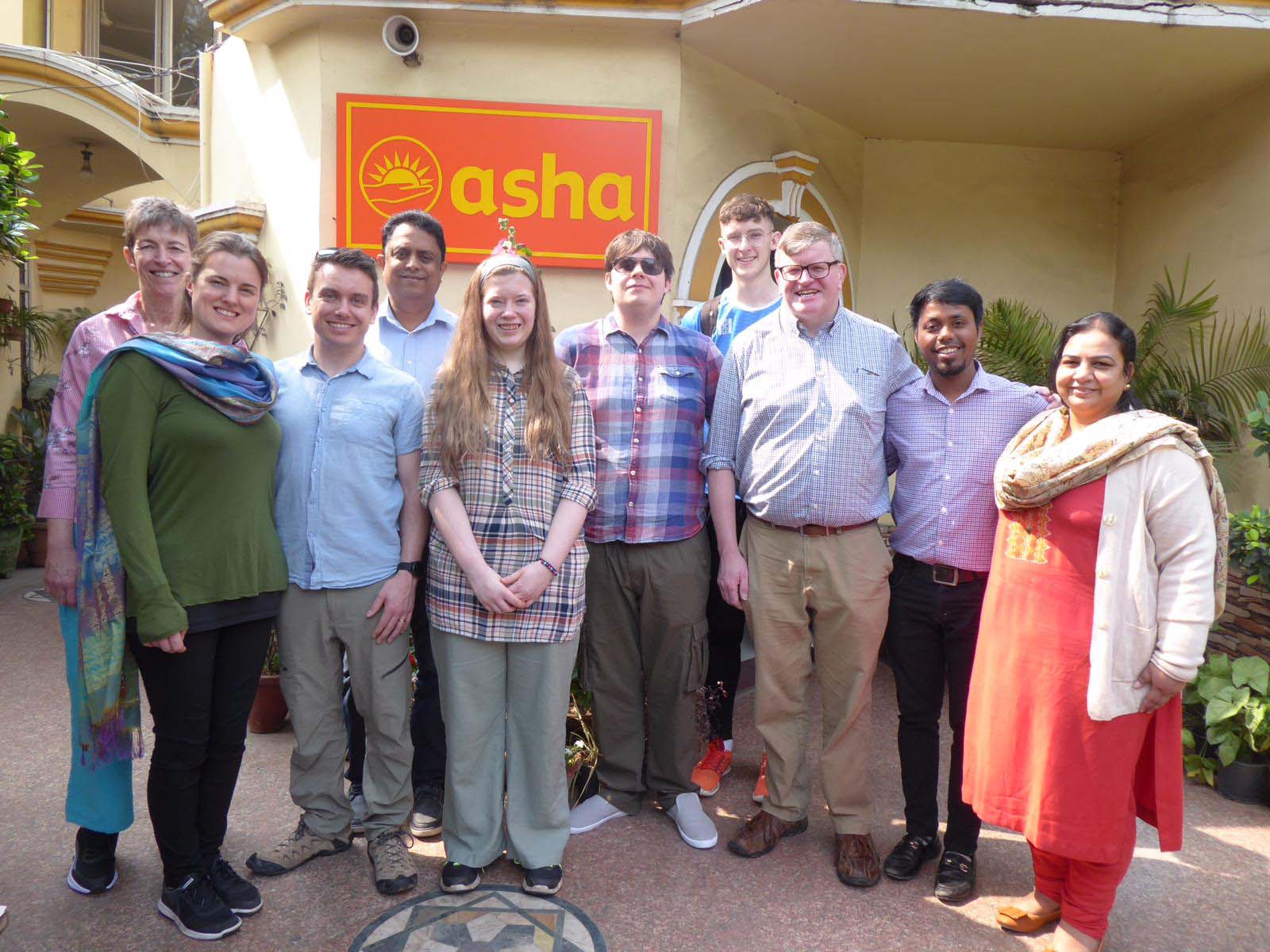 The Holywood Parish team, which returned in March 2020, with staff at Asha's headquarters.