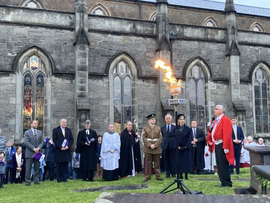 Her Majesty's Deputy Lieutenant for Fermanagh lighting the beacon after the Service.