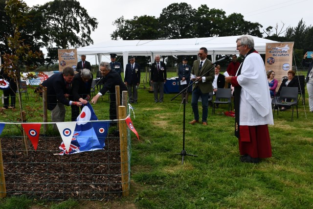 Relatives of the fallen airmen unveil a memorial stone in Ballykelly.