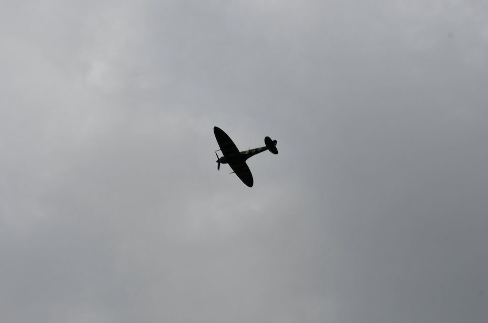 The RAF pays tribute to its fallen colleagues with a flypast by a Spitfire.
