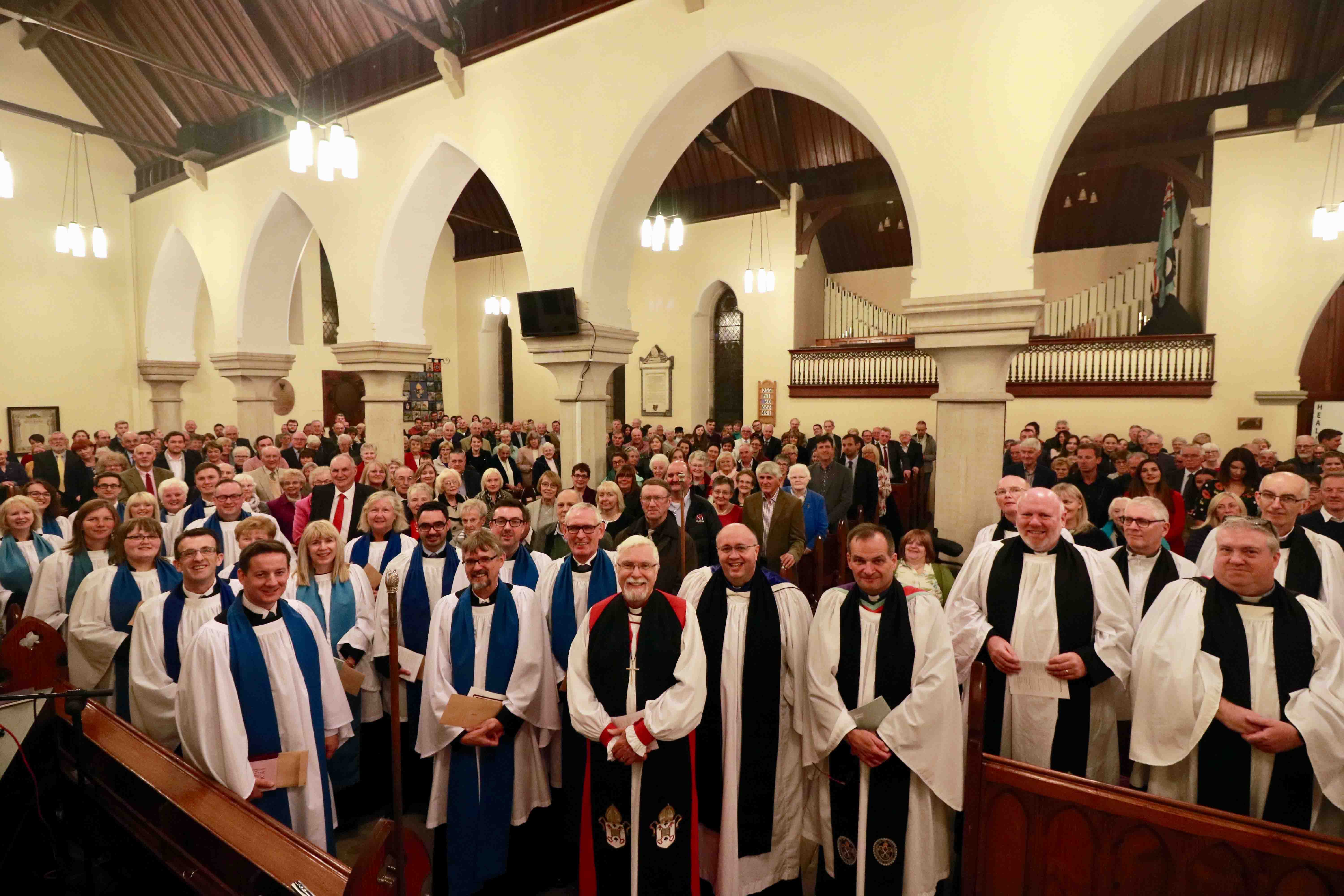 Bishop, readers, clergy and congregation.