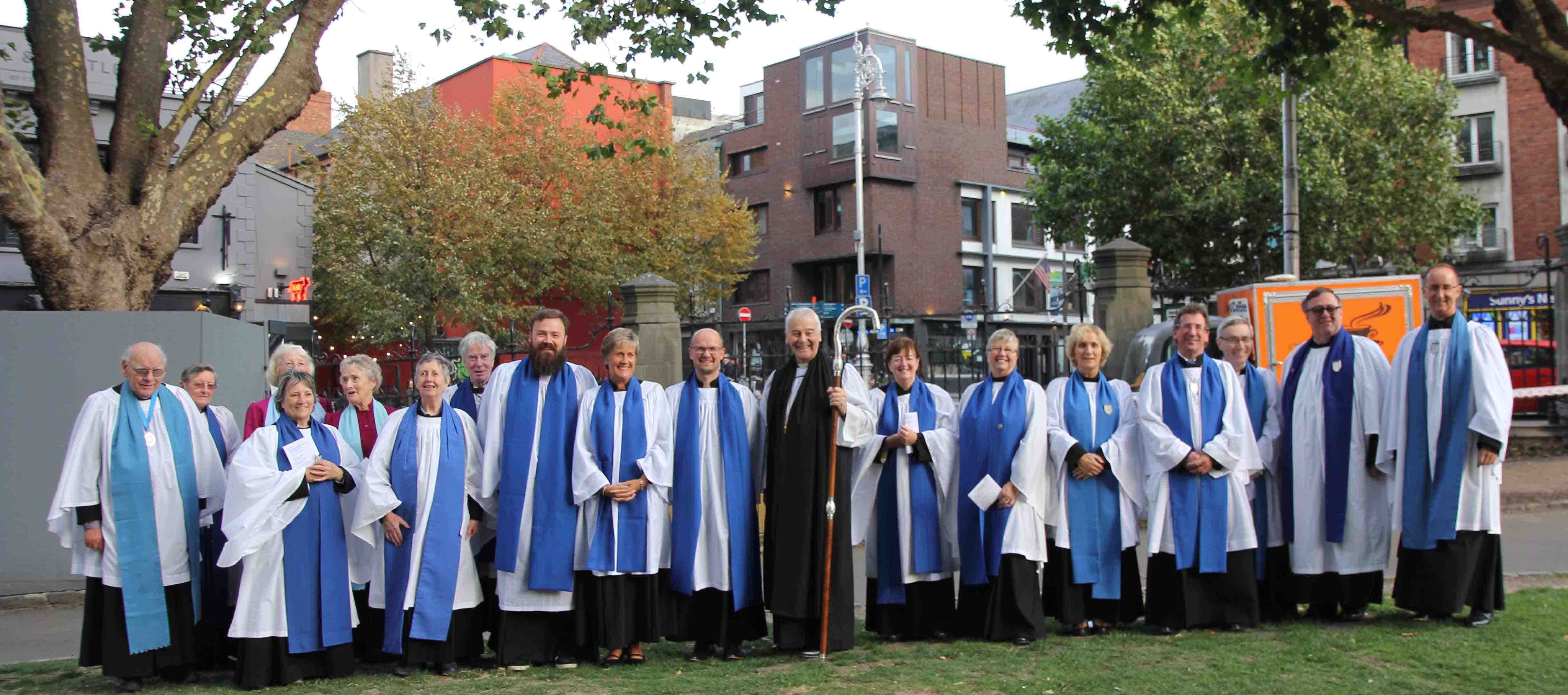 Newly commissioned Diocesan Readers Ruth Gyves, Scott Hill and Scott Evans with their fellow Diocesan Readers and Archbishop Michael Jackson.