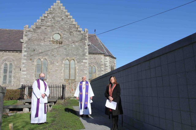 The Revd John Marchant, Archbishop Michael Jackson and church warden Miriam Hollowed following the dedication of the columbarium wall at St Matthew's Irishtown.