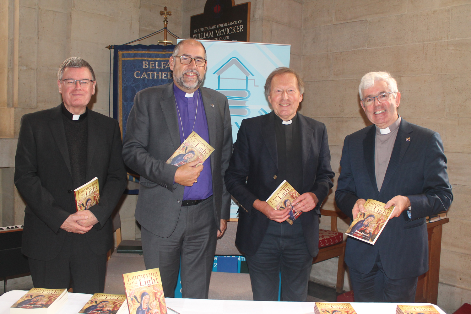 From left: Fr Eddie O'Donnell, Bishop George Davison, Journeying in the Light author John Mann and Dean of Belfast, the Very Rev Stephen Forde.