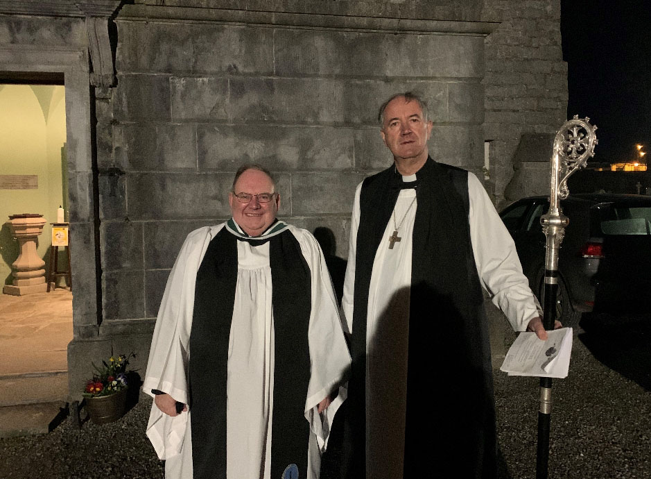 Dean James Mulhall with Bishop Michael Burrows.