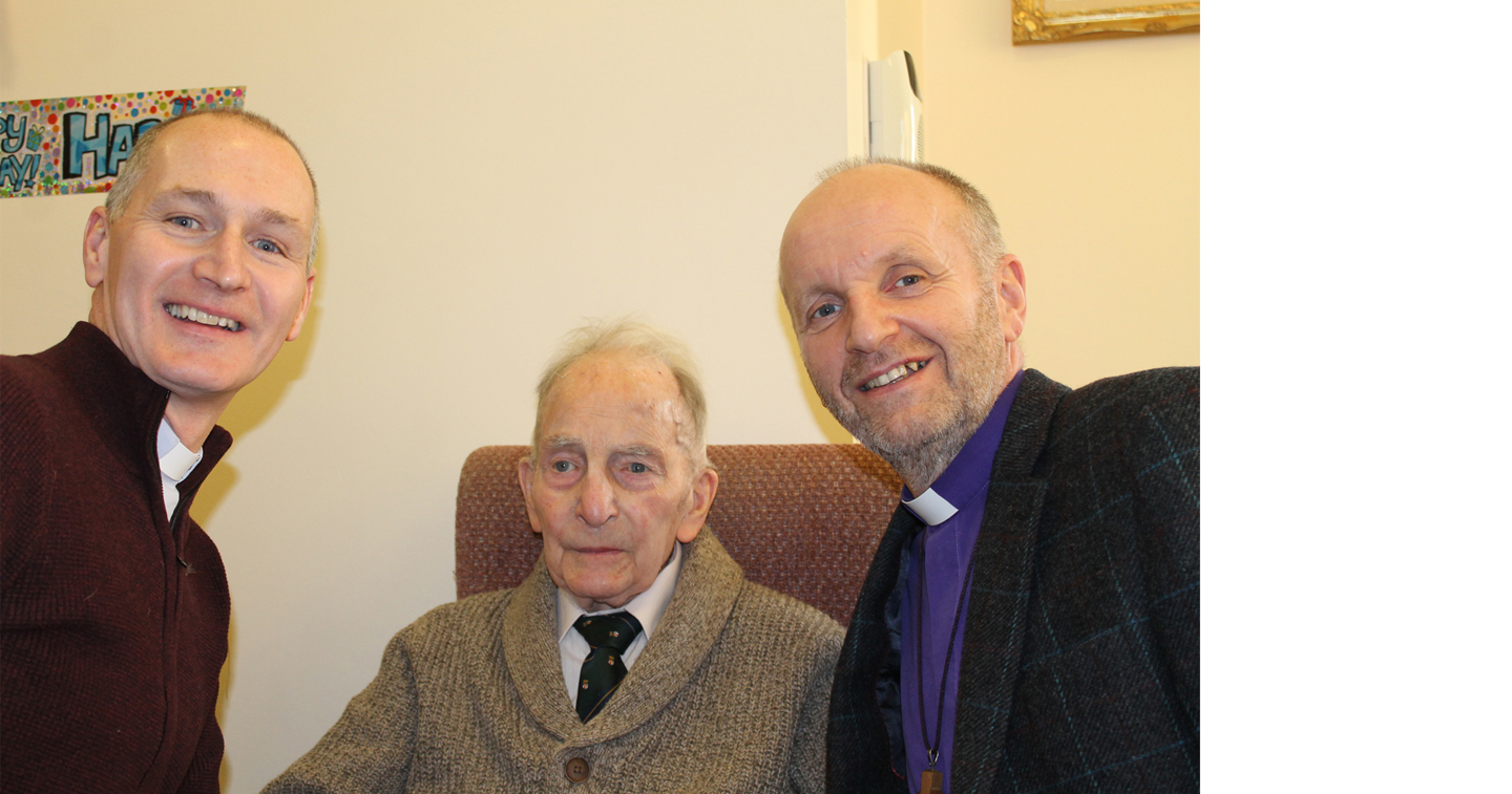 Mr Bertie O'Neill, Greenisland Parish, celebrates his 100th birthday with the Rev Paul Lyons and the Bishop of Connor, the Rt Rev Alan Abernethy.