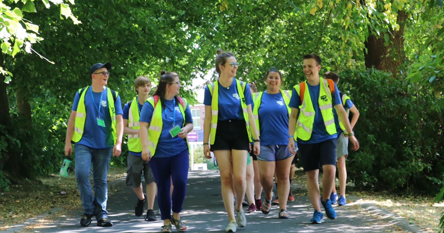 The Americans from Christ In Youth pictured in Shankill Memorial Park with Diocesan Youth Officer Christina Baillie during their walk around Belfast at the start of their two–week stay.