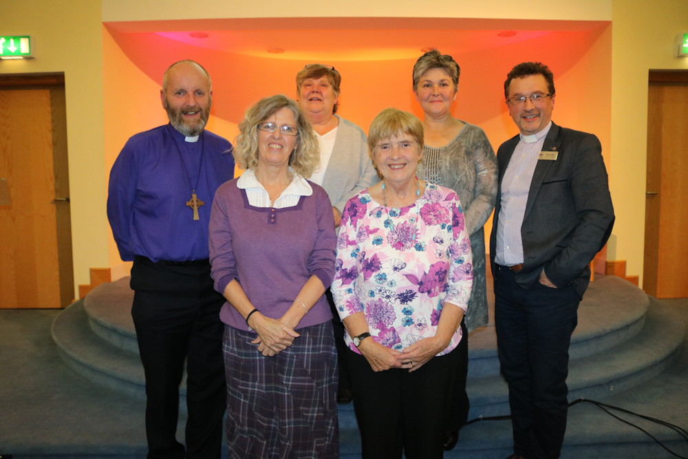 Some of those who took part in the evening session of Connor Synod which heard stories of outreach work in parishes with Bishop Alan Abernethy and Archdeacon Paul Dundas. Included are Alison Shaw and Dorothy Coates from St Aidan's, Sandy Row, front, and Janis Bennett and Heather Smith from Immanuel Church, Ardoyne, back.