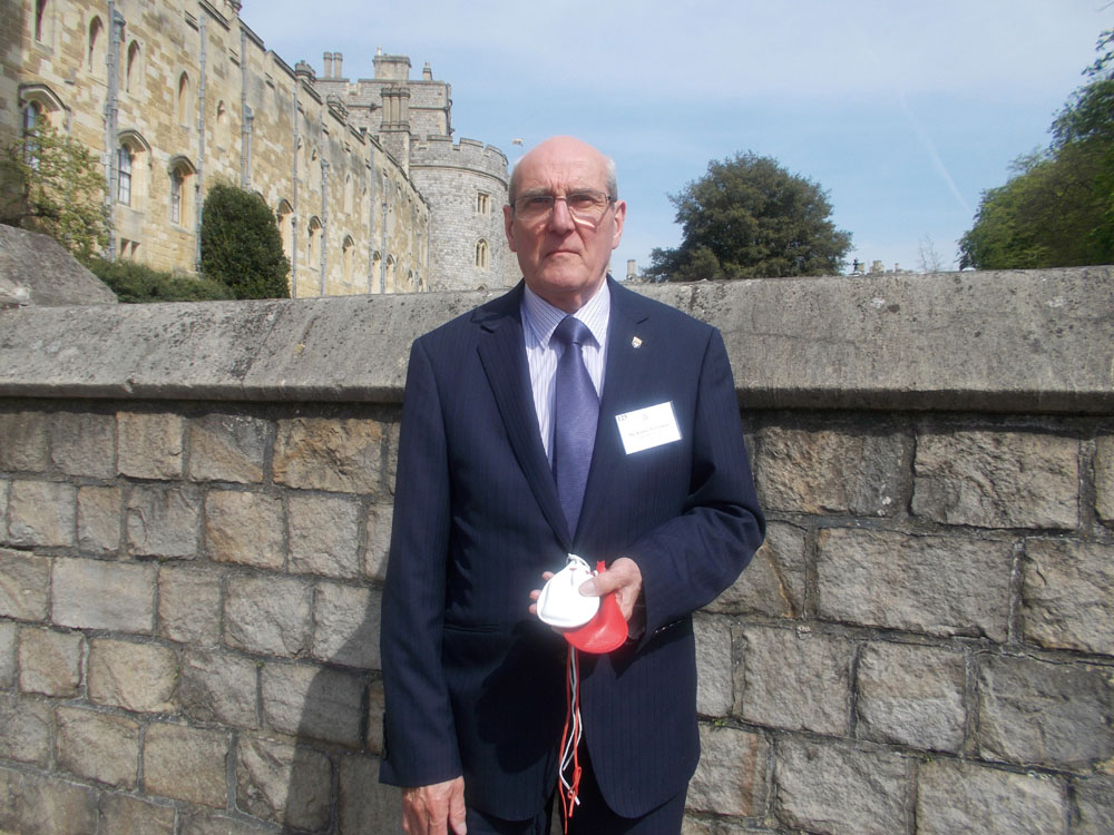 Mr Jim Patterson with the Maundy purses he received from Her Majesty the Queen at Windsor Castle.