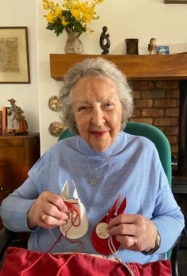 Mrs Paddy Wallace, a parishioner of All Saints', Antrim, Diocese of Connor, with her Maundy Purse.