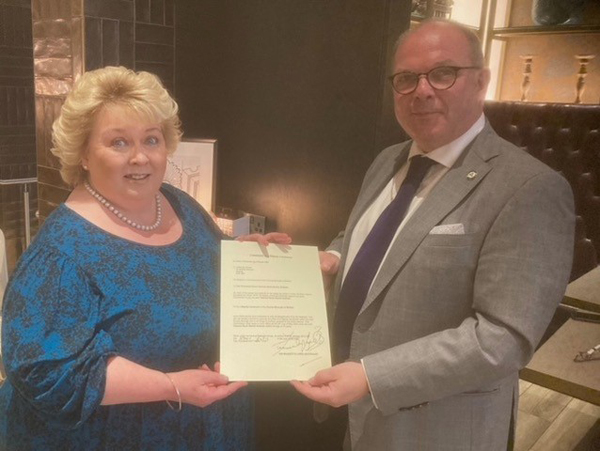The Lord Lieutenant, Dame Fionnuala Jay-O'Boyle DBE DStJ DDL (Hon QUB) presenting Canon Graham with his Commission as a Deputy Lieutenant. Photograph taken by Dr Alan Boyd DL, Vice Lord Lieutenant of the County Borough of Belfast.