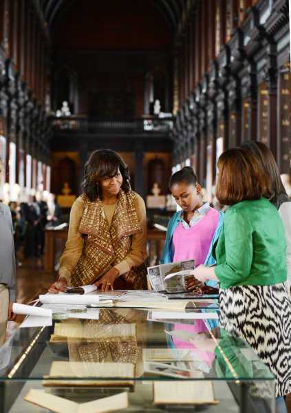 Michelle Obama and daughters view parish records at TCD